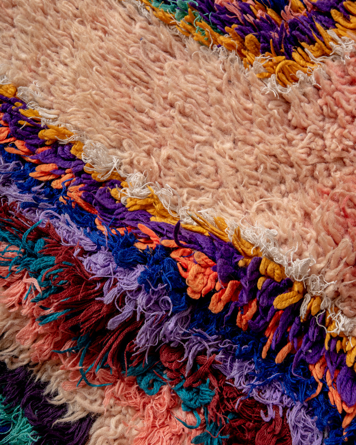 Modern, designer, handcrafted Berber rug from Morocco. Vintage carpet with beautiful colours and patterns and fluffy texture.